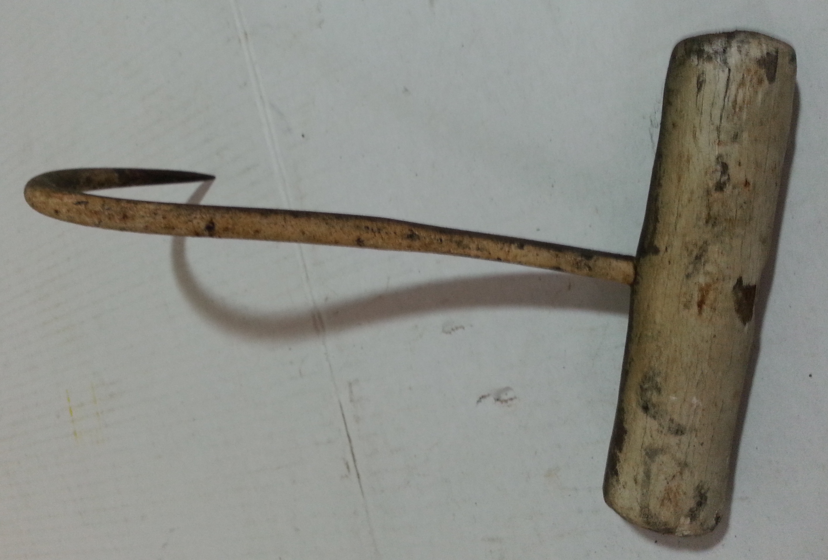 antique hook with wood handle